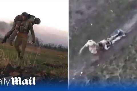 Two hero Ukraine soldiers save their wounded comrades by carrying them across Bakhmut battlefields