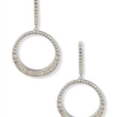 From Anne Klein, these earrings feature:Drop earringsSilver-tone hardwareLever back closureApprox...